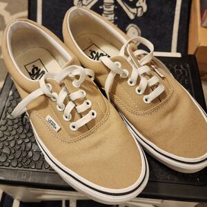 Tan Vans low tops